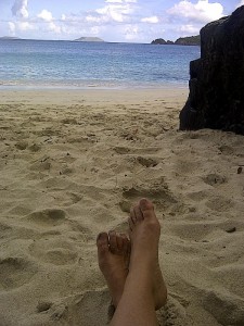 Barefoot on the beach in St. John