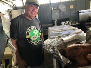 Residents of hurricane-ravaged St. John in the USVI celebrate Thanksgiving with the annual "Thankspigging" feast.